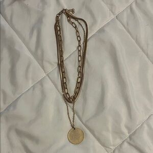 Gold colored 3 strand necklace